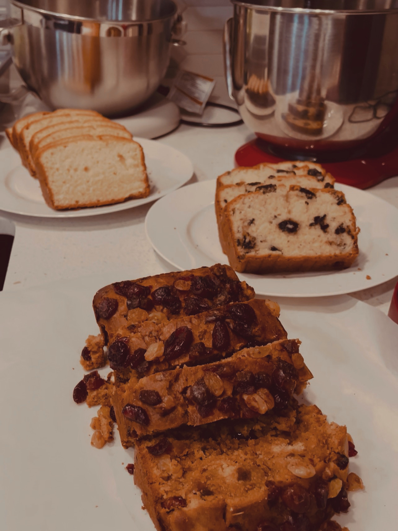 Sliced GoodCake loaf cakes with chocolate chip and fruit toppings